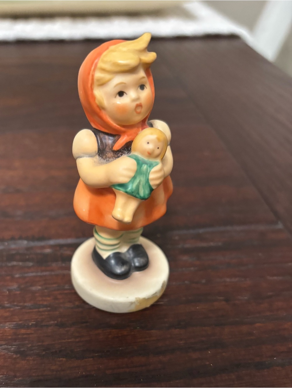 Hummel-Vintage-Style Orange Girl Figurine Holding Doll -